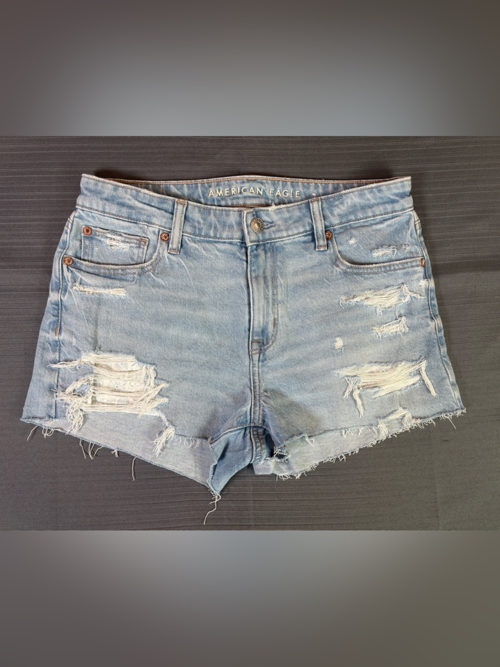 American Eagle Perfect Shortie Denim Shorts Size 4 Distressed Raw Hem Light Wash